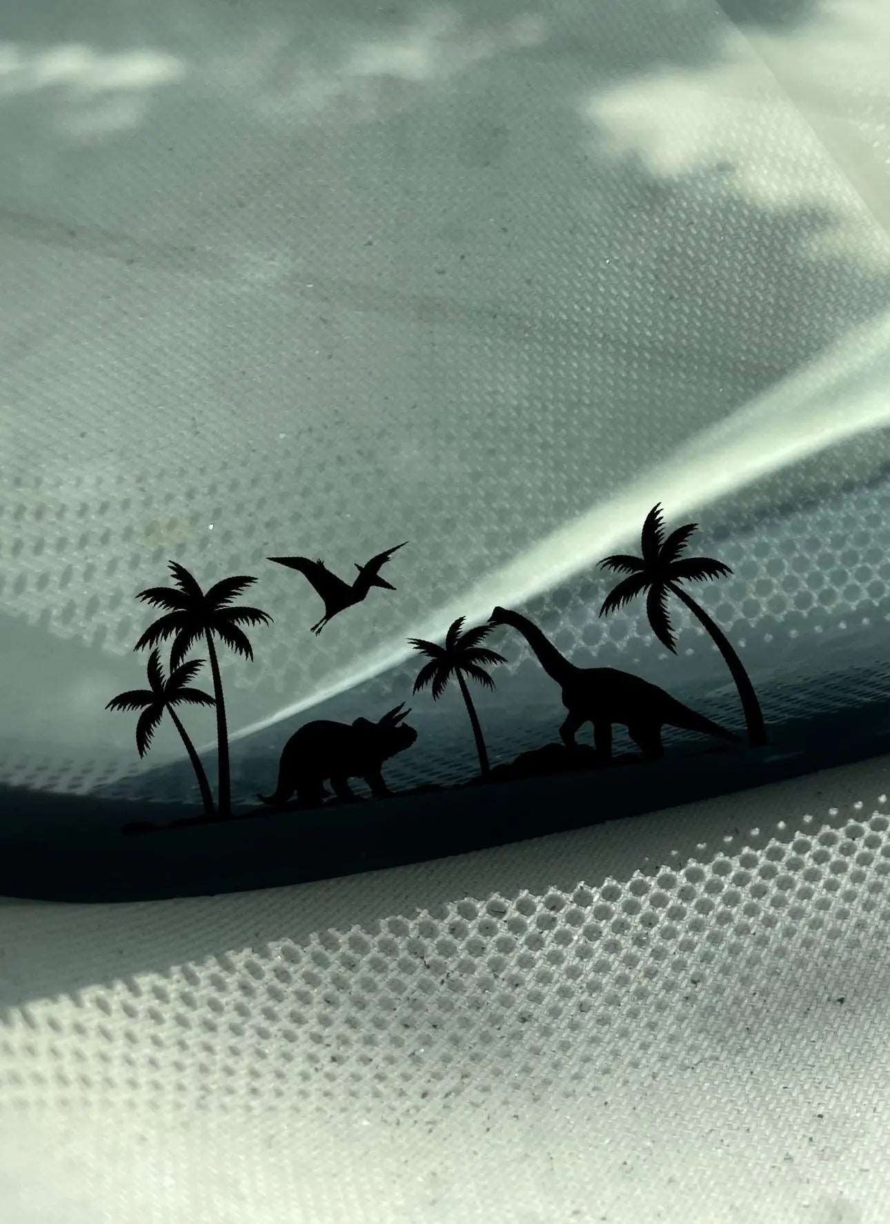 Palm Trees and Dinosaurs Easter Egg Decal by Boston Print Co. on a car