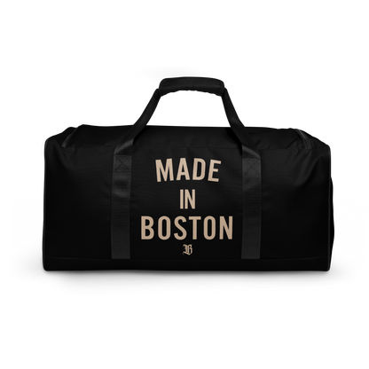 "Made in Boston" duffle bag, 100% polyester, adjustable padded shoulder strap, dual padded handles, mesh side pocket, and multiple inside pockets.