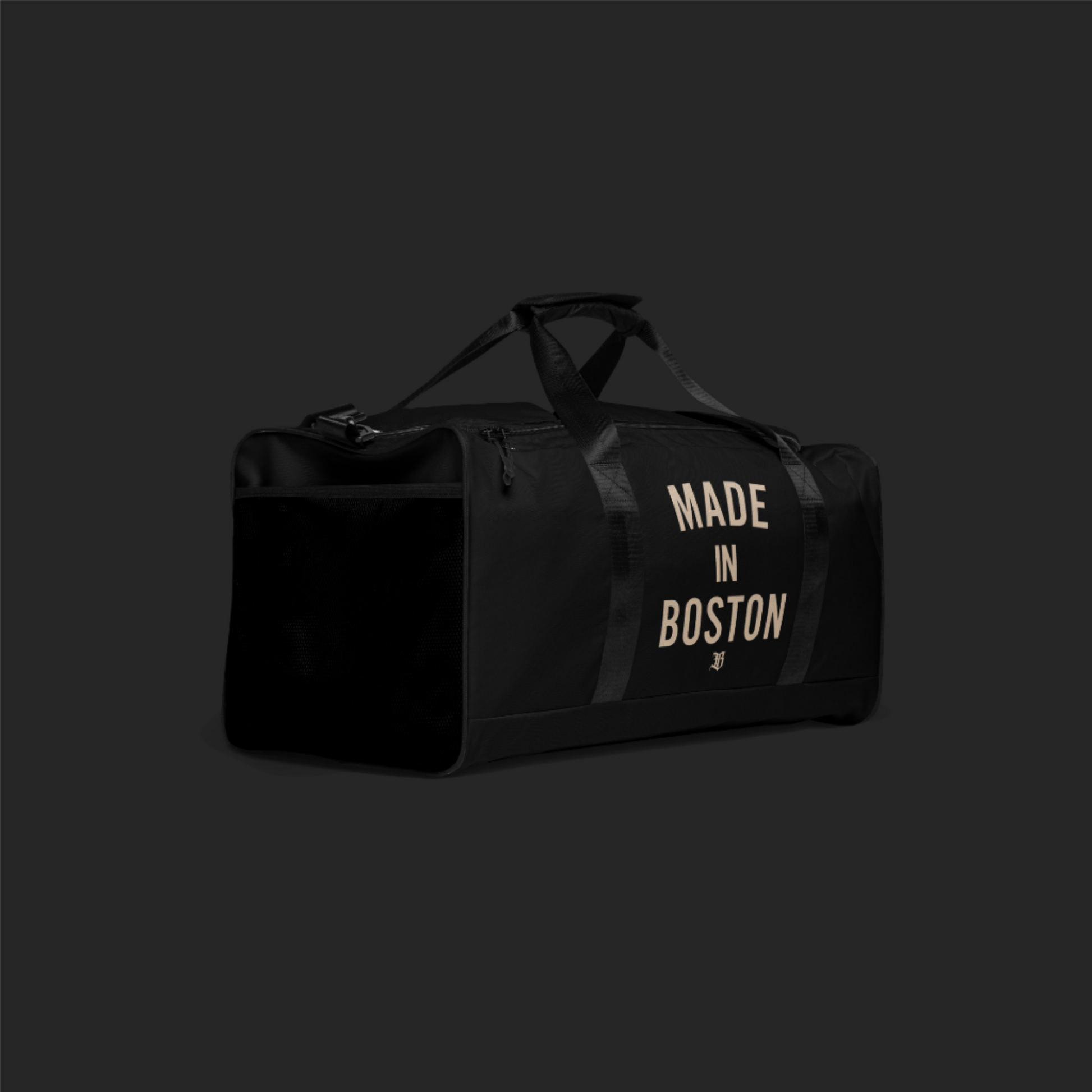 "Made in Boston" duffle bag, 100% polyester, adjustable padded shoulder strap, dual padded handles, mesh side pocket, and multiple inside pockets.