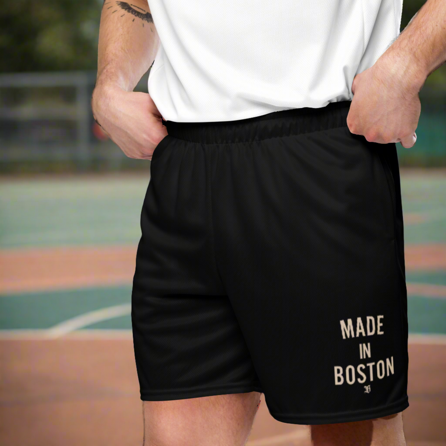 "Made in Boston" mesh shorts, lightweight and breathable, elastic waistband with drawstring, side pockets, and durable construction.