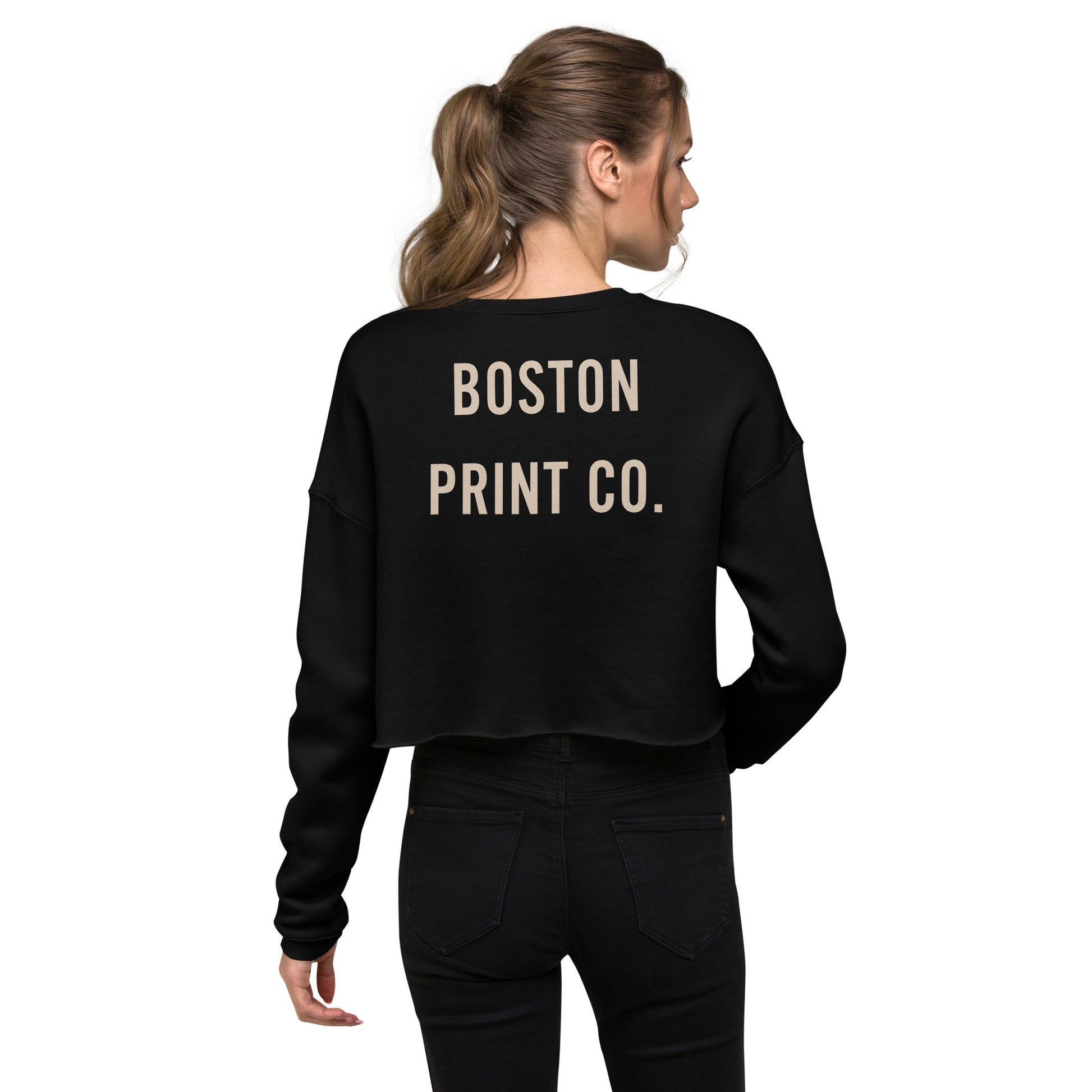 "Made in Boston" crop top, 52% airlume combed and ring-spun cotton, 48% poly fleece, cropped body with raw hem, ribbed crew neckline, and dropped shoulder cut.