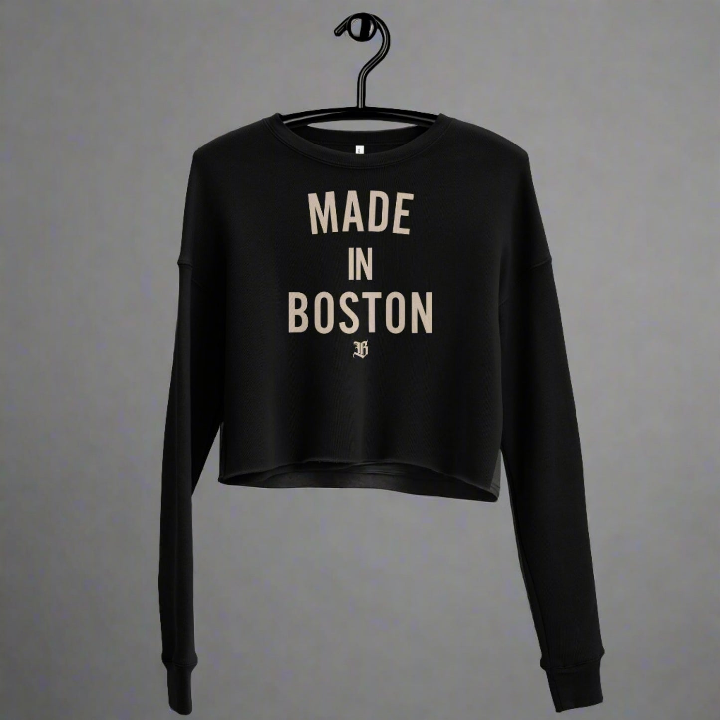 "Made in Boston" crop top, 52% airlume combed and ring-spun cotton, 48% poly fleece, cropped body with raw hem, ribbed crew neckline, and dropped shoulder cut.